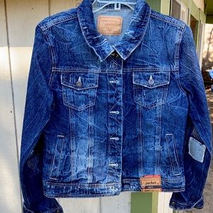 Distressed look denim jacket